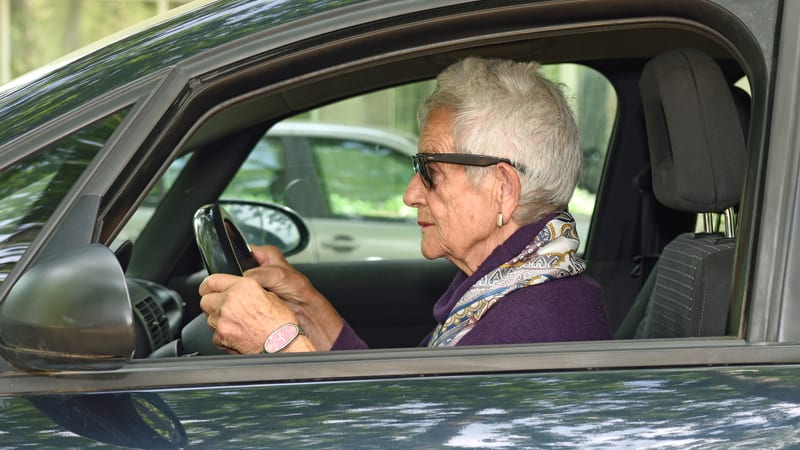 Elder mom behind the wheel