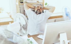 Senior man loves air conditioning Image