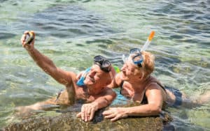 senior snorkelers. Credit: mirko vitali dreamstime. For article on Boomers Financing Post-COVID Travel Image