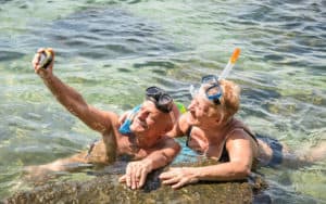 senior snorkelers. Credit: mirko vitali dreamstime. For article on Boomers Financing Post-COVID Travel Image