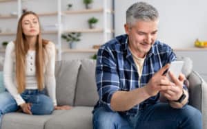 Middle aged man is too close to his ex Image