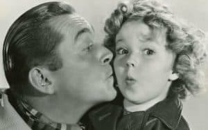 James Dunn and Shirley Temple publicity photo for Bright Eyes-front (cropped). Fox Film Corp publicity photo, Public domain, via Wikimedia Commons - for the famous kids trivia quiz Image