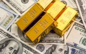 gold bullion ben franklins Roman Romaniuk Dreamstime. For article on family dinnertime discussion in 1971 Image