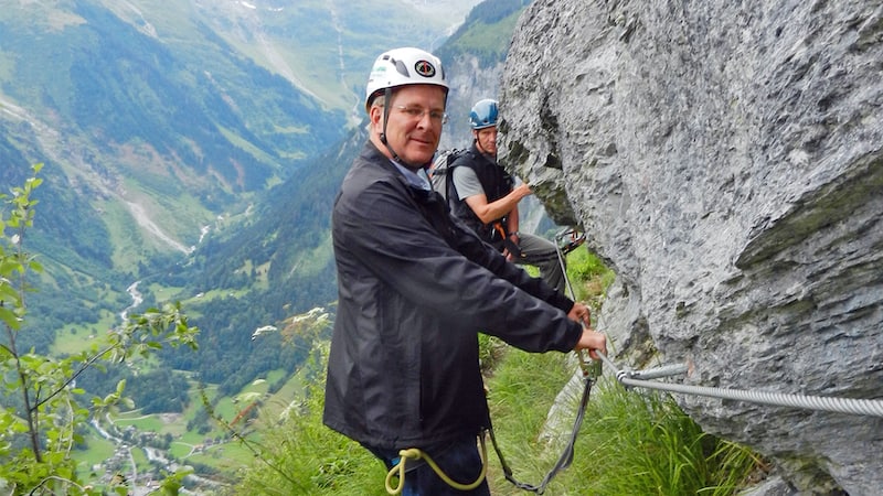 Buckled up as we embark on the via ferrata. CREDIT: Rick Steves, Rick Steves’ Europe. For article on Mürren Via Ferrata in Switzerland