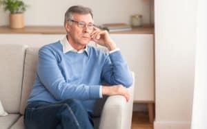 Senior man thinking about his Alzheimer's diagnosis Image
