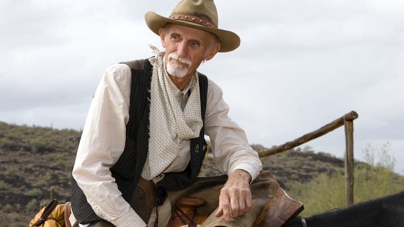 A rancher overlooks his herd