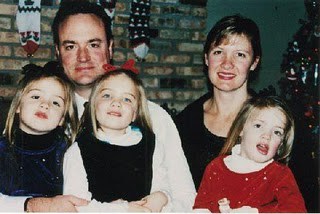 A holiday photo of Thomas Burnett Jr. and his family