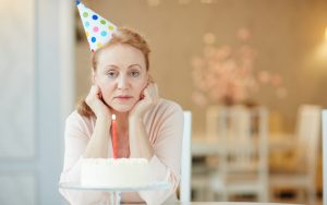 sad woman on her birthday (credit: Pressmaster Dreamstime.com) For article on When a birthday falls on a holiday Image