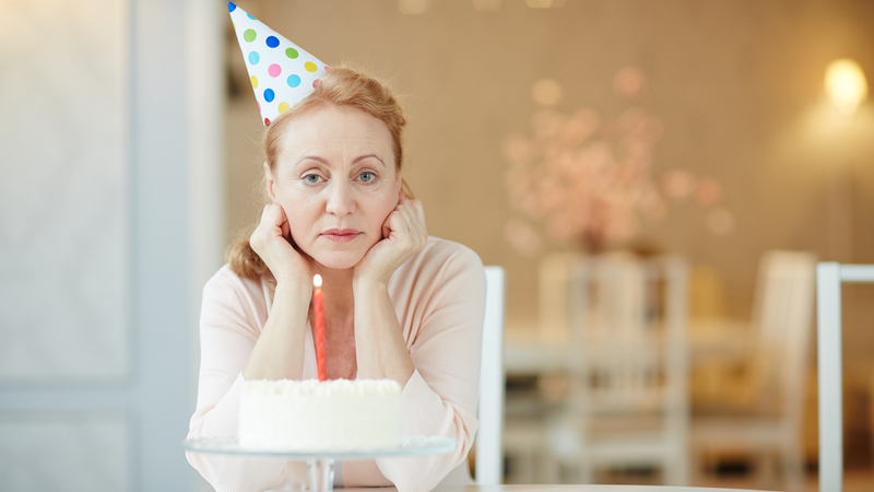 sad woman on her birthday (credit: Pressmaster Dreamstime.com) For article on When a birthday falls on a holiday Image