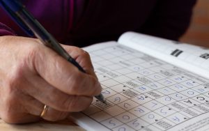 senior hand doing puzzle Jesus Garcia Dreamstime Image