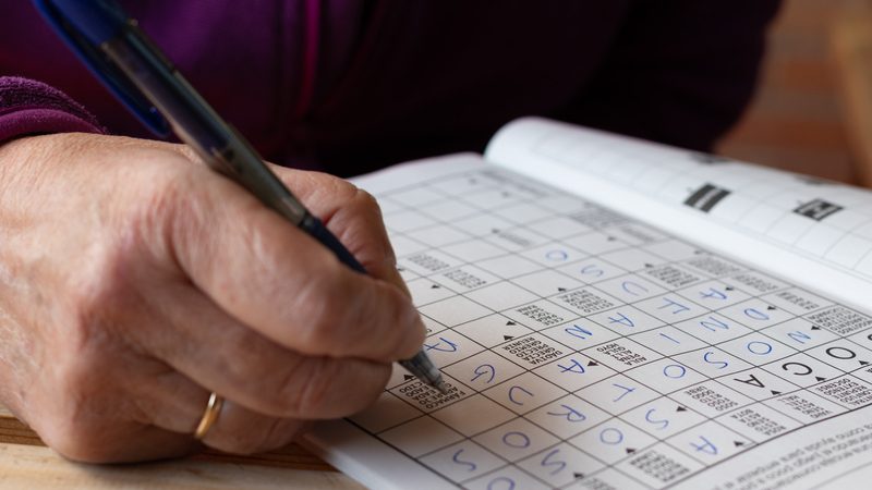 senior hand doing puzzle Jesus Garcia Dreamstime Image
