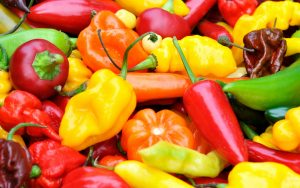 A selection of diverse chili peppers for article on Health Boost from Chili Peppers Image