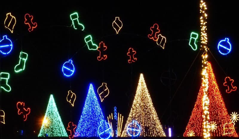 Illuminate lights with Christmas tree shapes and floating stocking, gingerbread men, and more