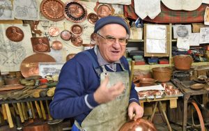 A coppersmith in Montepulciano, Italy. Image credit: Cameron Hewitt, Rick Steves' Europe. For article on European artisans Image