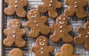 freshly baked gingerbread cookies on a cooling rack. For article on Chewy and Soft Gingerbread People Cookies Image