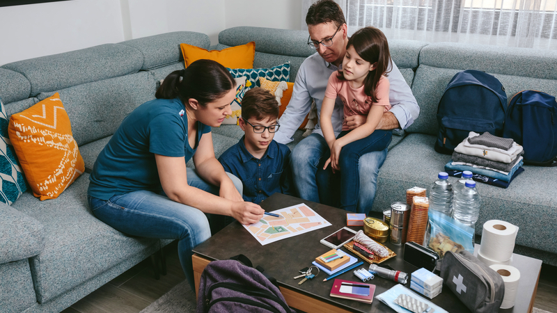 family preparing go bags of emergency supplies Photo David Pereiras Villagra Dreamstime