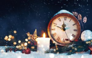 Clock, Christmas decorations, and snow to represent a New Year's Eve countdown to midnight: for What’s Booming: New Year’s Ideas and Just Plain Fun Image