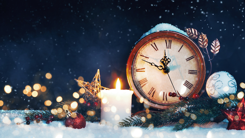 Clock, Christmas decorations, and snow to represent a New Year's Eve countdown to midnight: for What’s Booming: New Year’s Ideas and Just Plain Fun