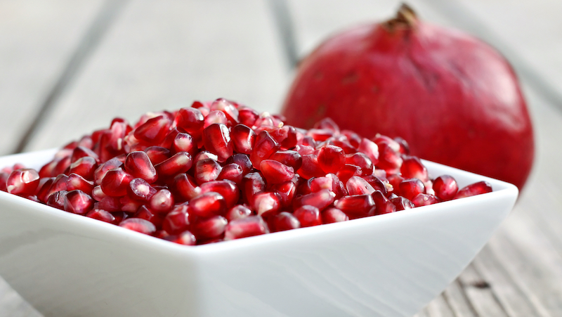 The mega-superfood seeds of pomegranates can help you fight off colds, boost your heart health, and even give you more energy at the gym. For article on 6 pomegranate health benefits.