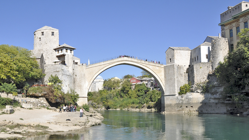 Mostar and its famous bridge, rebuilt after the war. For article, In Bosnia, Mostar’s Tragic Past Still Lives Image