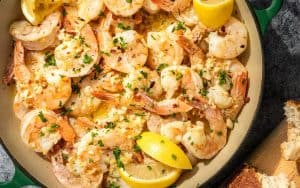 This super-simple baked shrimp recipe delivers buttery, garlicky, full-flavored shrimp in under an hour. For article, This baked shrimp recipe takes the garlic flavor to the next level by marinating the shrimp in garlic before cooking. Image