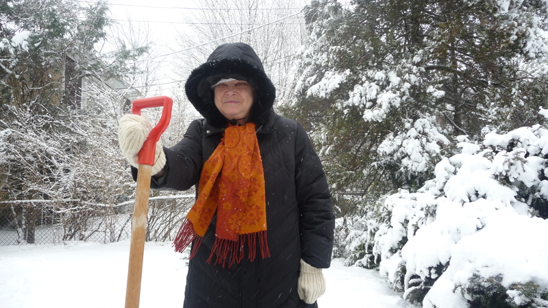 woman with a snow shovel Photo by Tatianatatiana Dreamstime. For article, A reader admits to advice columnist Amy Dickinson, “I’m jealous of my retired friends!” See what Amy has to say.