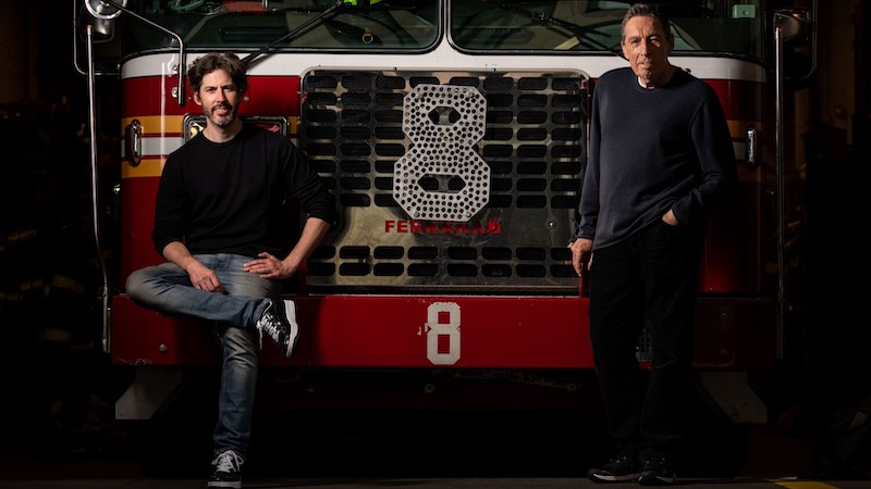 Father and Son, Directors Jason and Ivan Riteman, pose for a portrait at the Hook and Ladder Company 8 Firehouse on Friday, Oct. 8, 2021 in New York, NY. (Kent Nishimura / Los Angeles Times). For article, Ray Parker Jr. Remembers Ivan Reitman