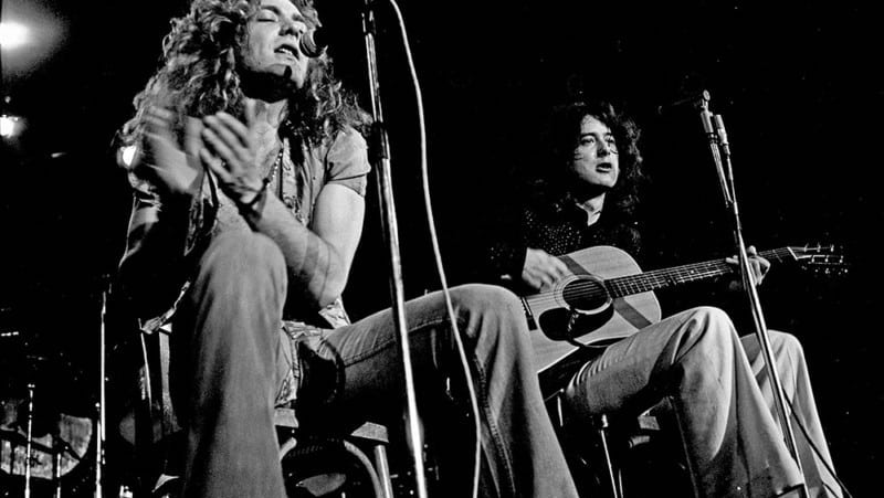 Robert Plant and Jimmy Page of Led Zeppelin playing Hamburg, Germany, in 1973 | Photograph by Heinrich Klaffs. For article, “Travelin’ Memories with 100 Greatest Rock Songs”