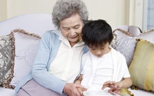 grandmom grandson on tablet puzzle Imtmphoto Dreamstime Image