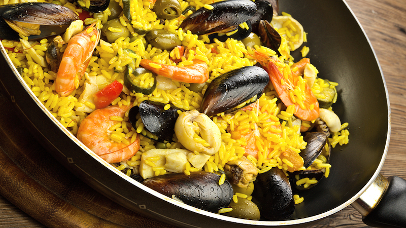 paella Photo by Photopips Dreamstime. A taste of paella and empanadillas from Kuba Kuba Dos, sister to chef Manny Mendez’s Cuban restaurant, serving Richmond diners since 1998. Image