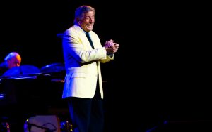 Tony Bennett performs Photo by Mathayward Dreamstime. For article, In the Season Four finale of “The Marvelous Mrs. Maisel,” Tony Bennett managed to star without having to show his face or sing a note. Image