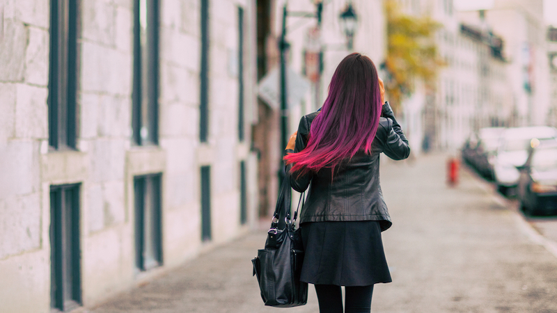 woman in leather jacket from behind photo by Martinmark Dreamstime