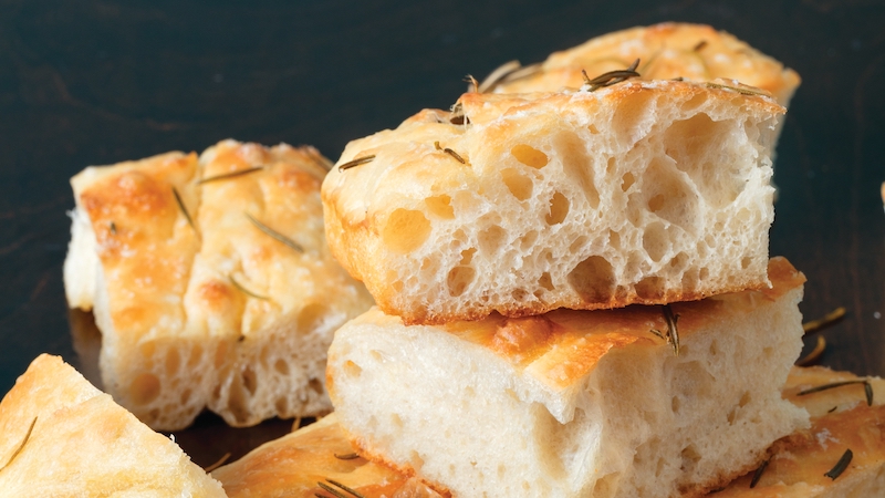 America’s Test Kitchen brings us their tested recipe for Roman-style focaccia, a soft, delicious bread that’s like a traditional pizza bianca.