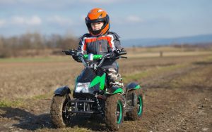Young child on an ATV. Despite parents' rules, in-laws take the 5-year-old grandson on ATV rides. See what Ask Amy says when grandparents ignore parents’ requests. Image
