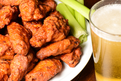 buffalo wings and beer photo by Brandon Bourdages Dreamstime, for best sports bar article