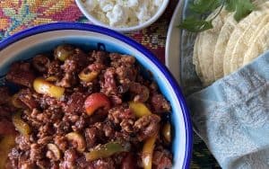 A little chipotle chile adds smoky notes and punch of heat. Turkey picadillo recipe from JeanMarie Brownson uses ground turkey, fire-roasted tomatoes, soul-warming spices, cheese, raisins, and more.  Image