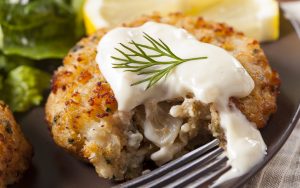 crab cakes photo by Bhofack2 Dreamstime, Food and travel writer Steve Cook shares six favorite beach restaurants, in Maryland, Virginia, North Carolina, and South Carolina. Image