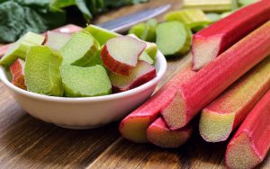 fresh rhubarb on a kitchen table. photo by Nadin333 Dreamstime Image