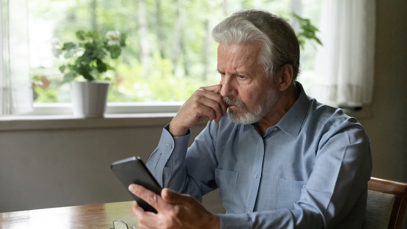 man frustrated with smartphone app photo by Fizkes Dreamstime. Greg Schwem says, ‘I have no more passwords left to give’ as he finds humor in the madness of app technology and passwords.