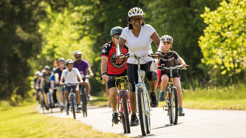 Bikers of all ages along the Virginia Capital Trail. Our top picks will have you rocking under the stars, walking through history, and biking along one capital trail. All in this week’s What’s Booming: Mother’s Day Music and More.