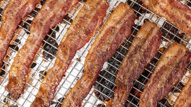 Bake brown sugar-crusted bacon slices until the strips sizzle and the edges curl from the molten sugar. Upgrade to Candied Bacon for the ultimate breakfast or brunch: sweet, salty, savory – just the thing for a decadent (yet easy!) morning meal.
