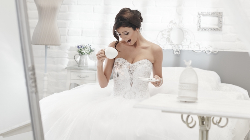 Bride spilling coffee on wedding dress. Ask Amy wedding disaster stories