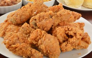 platter of fried chicken - photo by Msphotographic, Dreamstime. Make a landing at King’s Korner restaurant at Chesterfield County Airport, for chicken and barbecue, buffets and brunches, and airplanes. Image