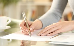 woman writing letter - photo by Info723783, Dreamstime. “Upset Aunt,” devastated when someone reads a letter she considered private, asks, “Aren’t all letters private?” See what Ask Amy says. Image