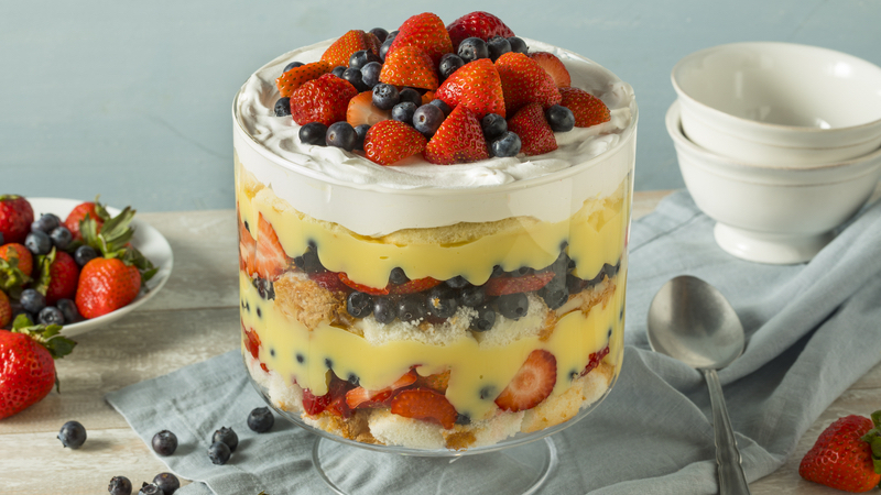Berry trifle - photo by Bhofack2, Dreamstime. The delicious blend of fresh and rich flavors comes together with the fruits of summer in this berry trifle for a breathtaking and mouthwatering presentation.