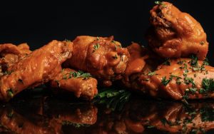 Chicken wings from Cocky Rooster restaurant for article on National Chicken Wing Day Image