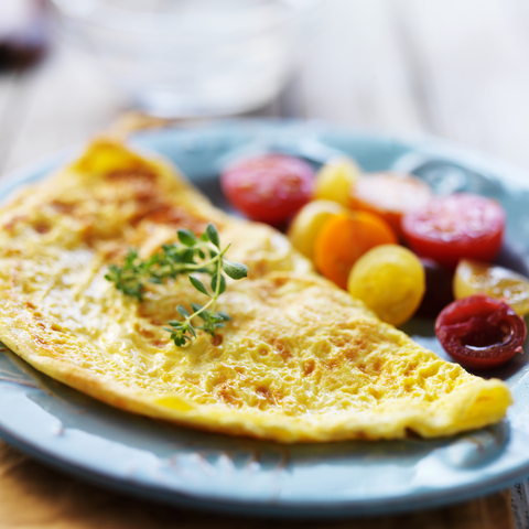 cheese omelet with thyme and cherry tomatoes - photo by Joshua Resnick, Dreamstime. For article on kidney-friendly recipes