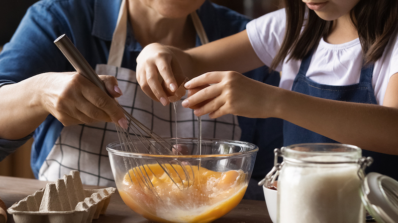 grandmom and grandkid making eggs. Photo by Fizkes, Dreamstime. These three easy-to-make, delicious, kidney-friendly recipes help caregivers provide nutritious meals for elderly parents in their care.