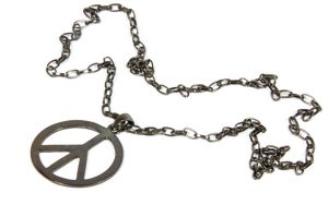 necklace with peace pendant, from the 1960s. Photo by Lcswart, Dreamstime. From his teen years to young adulthood, writer and baby boomer Robert Koehler reflects on self-determinism and growing up. Image