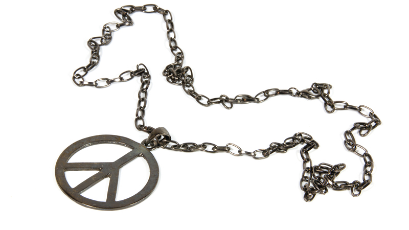 necklace with peace pendant, from the 1960s. Photo by Lcswart, Dreamstime. From his teen years to young adulthood, writer and baby boomer Robert Koehler reflects on self-determinism and growing up. Image